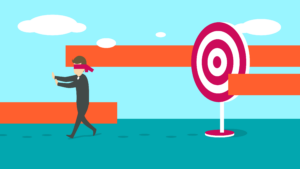 A blindfolded man runs away from a target.